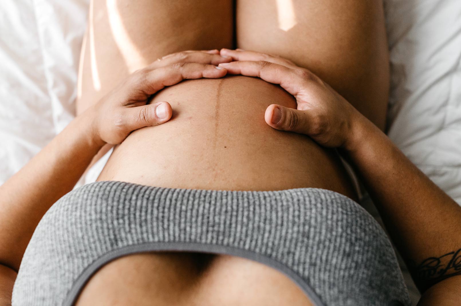 pregnant mom holding belly