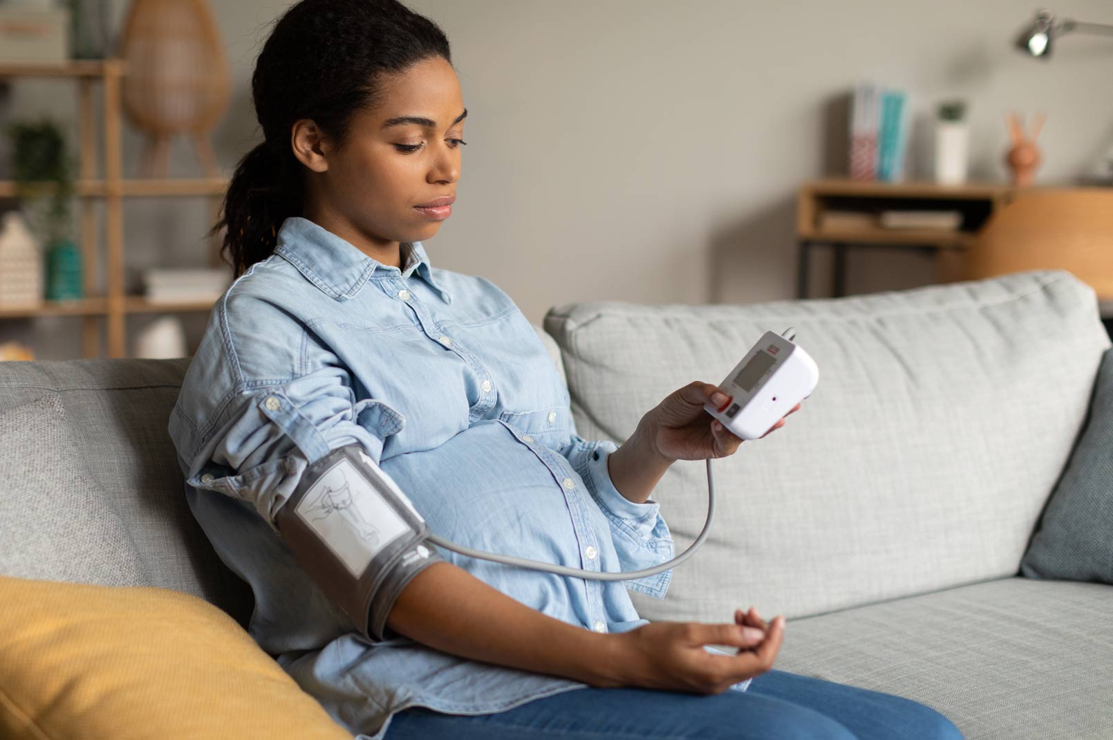 woman taking blood pressure